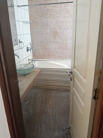 Bathroom in 5 BHK Apartment at Unitech Uniworld Gardens, Sector 47 – for Rent