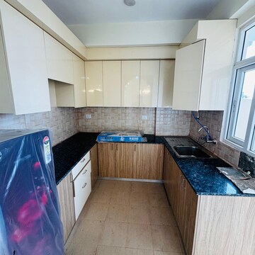 Kitchen in 3 BHK Apartment at Amrapali Crystal Homes, Sector 76 – for Rent