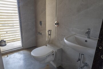 Bathroom in 3 BHK Apartment at Gokhale Road – for Sale