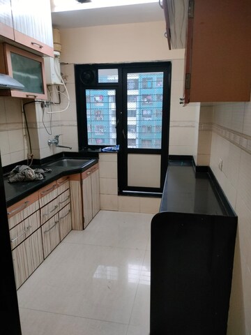 Kitchen in 1 BHK Apartment at Shivraise Apartment, Kandivali East – for Rent