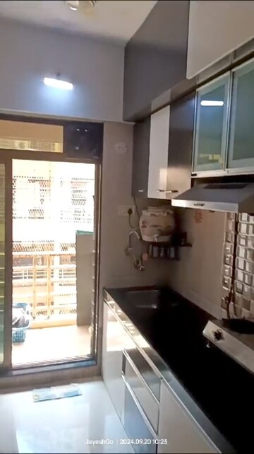 Kitchen in 2 BHK Apartment at Abhay Sheetal Complex, Mira Road – for Sale