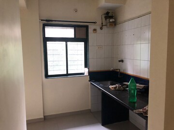 Kitchen in 1 BHK Apartment at Rutu Enclave, Kasarvadavali – for Sale