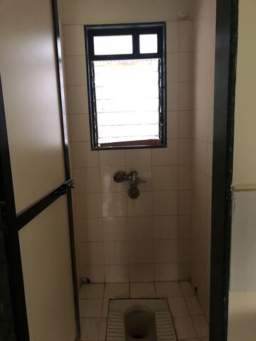 Bathroom in 1 BHK Apartment at Rutu Enclave, Kasarvadavali – for Sale