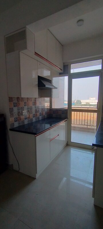 Kitchen in 2 BHK Apartment at Suncity Avenue 76, Sector 76 – for Rent