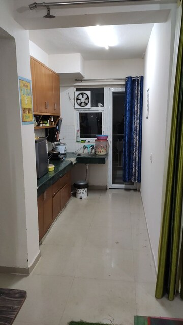 Kitchen in 2 BHK Apartment at Shree Vardhman Green Court, Sector 90 – for Rent