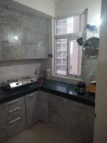 Kitchen in 2 BHK Apartment at Shree Vardhman Green Court, Sector 90 – for Rent