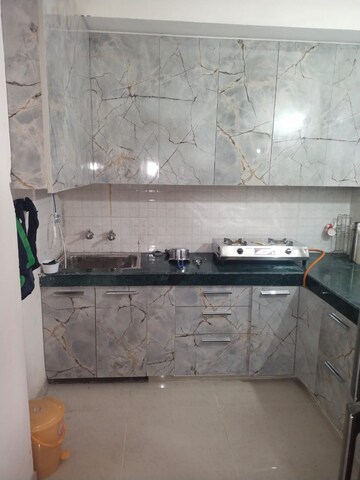 Kitchen in 2 BHK Apartment at Shree Vardhman Green Court, Sector 90 – for Rent