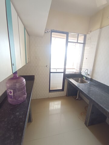 Kitchen in 1 BHK Apartment at Ajmera Rosemary And Rosewood, Kalyan West – for Rent