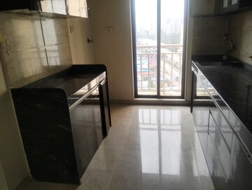 Kitchen in 3.5 BHK Apartment at Harmony Signature Towers, Owale – for Rent