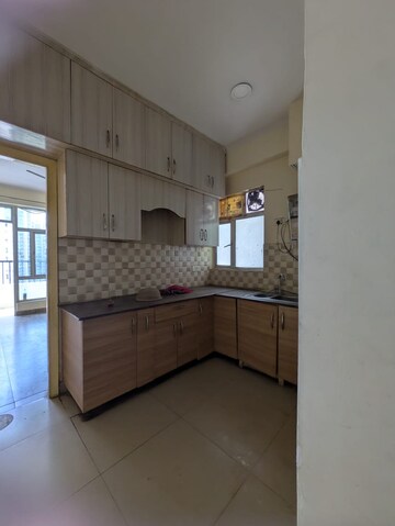 Kitchen in 2 BHK Apartment at Mahagun Mantra I, Sector 10 Greater Noida – for Rent