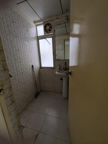 Bathroom in 2 BHK Apartment at Mahagun Mantra I, Sector 10 Greater Noida – for Rent