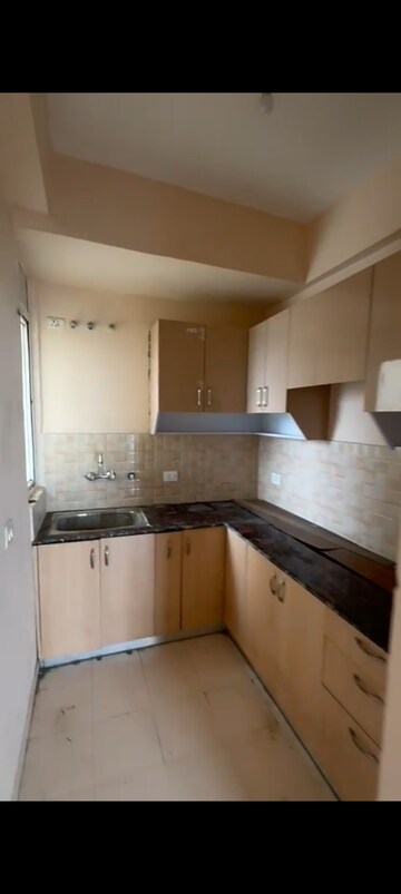 Kitchen in 3 BHK Apartment at Amrapali Dream Valley, Tech Zone 4 Greater Noida – for Rent