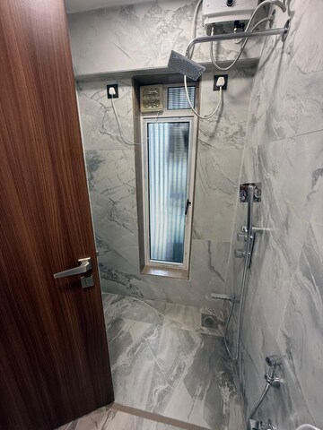 Bathroom in 2 BHK Apartment at Lotus Lotus Link Square, Malad West – for Rent