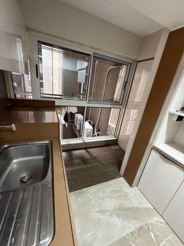 Kitchen in 2 BHK Apartment at Lotus Lotus Link Square, Malad West – for Rent