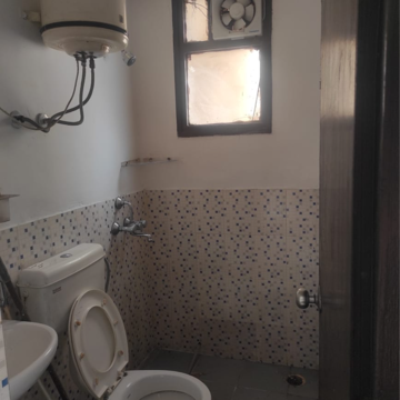Bathroom in 2 BHK Apartment at Apex Our Homes, Garoli Kalan – for Rent