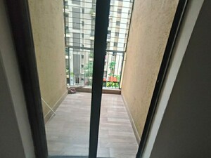 Building Lobby in 1.5 BHK Apartment at Lodha Lakeshore Greens, Dombivli East – for Sale
