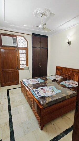 Bedroom in 3 BHK Builder Floor at East Of Kailash – for Rent