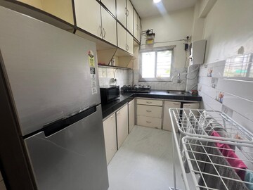 Kitchen in 2 BHK Apartment at Oshiwara Mhada, Andheri West – for Rent