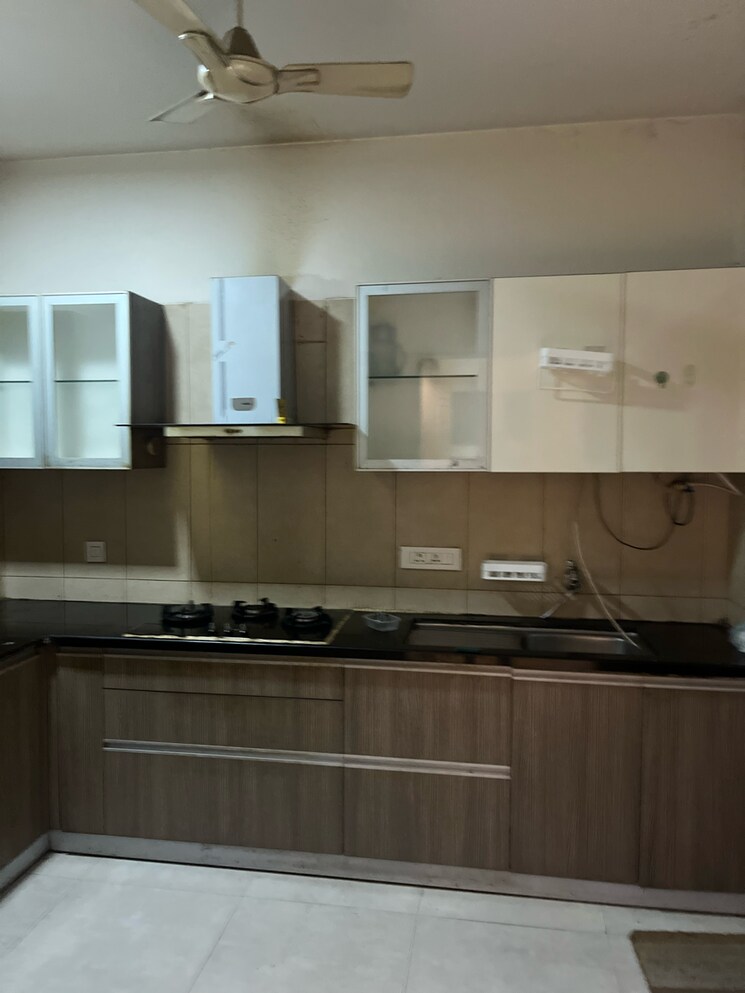 Kitchen, pride-purple-park-titanium 2.5 Bedroom 1200 Sq.Ft. Apartment In Jagtap Dairy Pune 9022341