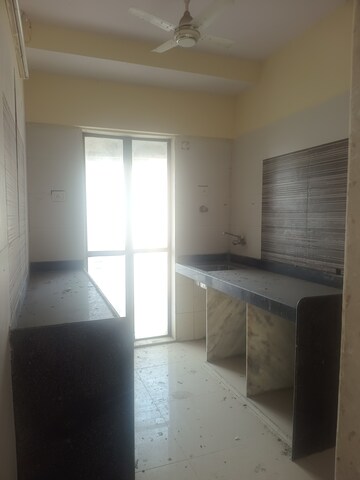 Kitchen in 1 BHK Apartment at Seven Apna Ghar Phase 2 Plot A, Mira Road – for Sale