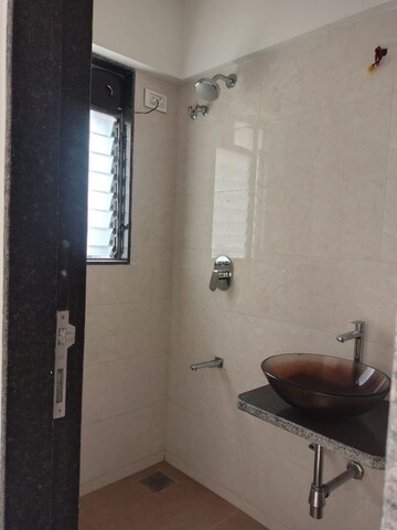 Bathroom in 2 BHK Apartment at Vile Parle West – for Rent