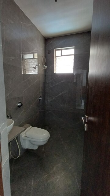 Bathroom in 2 BHK Apartment at Grandeur Giriraj Jewel, Talav Pali – for Rent