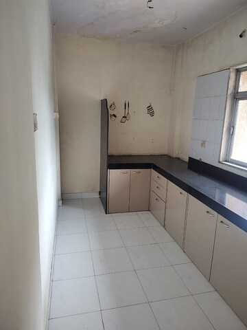 Kitchen in 2 BHK Apartment at Vedant Complex CHS, Samata Nagar – for Rent