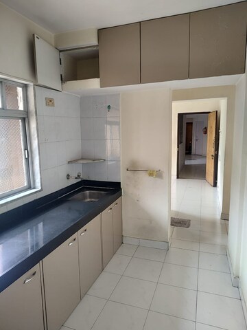 Kitchen in 2 BHK Apartment at Vedant Complex CHS, Samata Nagar – for Rent