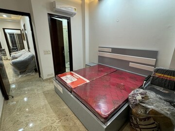 Bedroom in 3 BHK Builder Floor at Ansal Sushant Lok I, Sector 43 – for Rent
