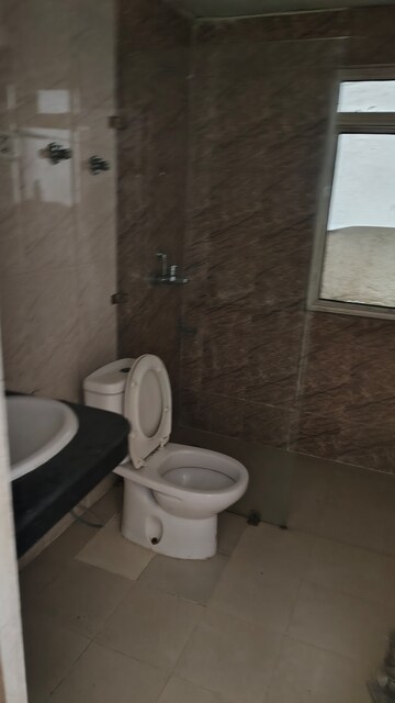 Bathroom in 3 BHK Apartment at Nimbus The Golden Palm, Sector 168 – for Rent