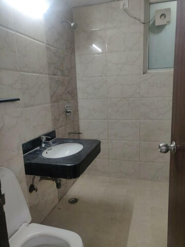 Bathroom in 2 BHK Apartment at Sikka Karnam Greens, Sector 143b – for Rent