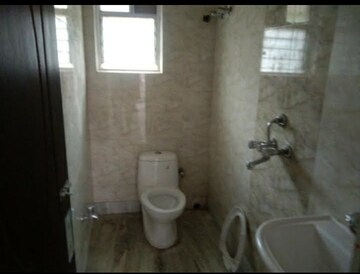 Bathroom in 3 BHK Builder Floor at Rash Behari Avenue – for Sale