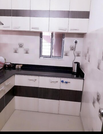 Kitchen in 3 BHK Builder Floor at Rash Behari Avenue – for Sale