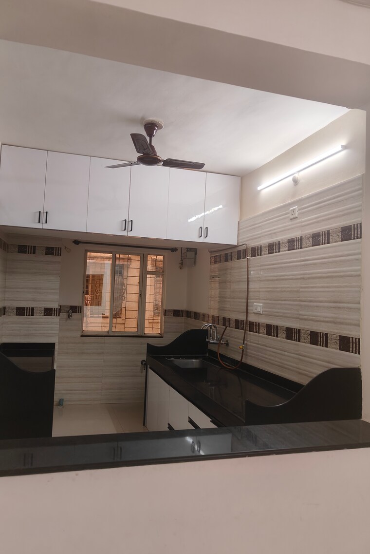 Kitchen, gk-rose-icon 2 Bedroom 920 Sq.Ft. Apartment In Pimple Saudagar Pune 9022992