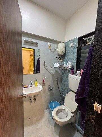 Bathroom in 2 BHK Apartment at Spark Mogra Vikas Chs, Andheri East – for Rent