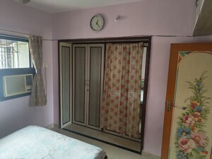 Bedroom in 2 BHK Apartment at Starwing Kaatyayni Enclave, Santacruz East – for Sale