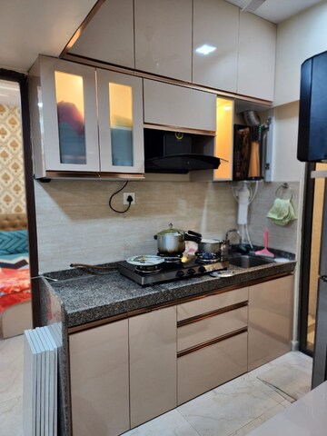 Kitchen in 1 BHK Apartment at Sunteck West World Phase 2 Tivri, Naigaon East – for Sale