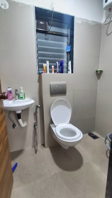 Bathroom in 1 BHK Apartment at Je And Vee Om Trimurti, Malad East – for Rent