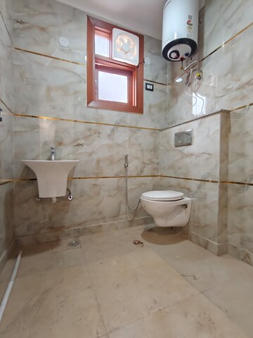 Bathroom in 3 BHK Builder Floor at Freedom Fighters Enclave – for Rent