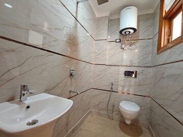 Bathroom in 3 BHK Builder Floor at Freedom Fighters Enclave – for Rent