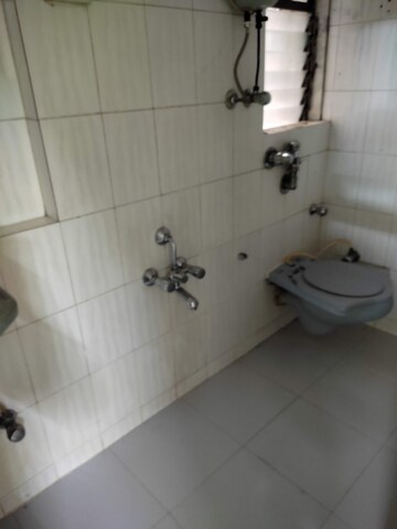 Bathroom in 1 BHK Apartment at Sonal Link Residency, Malad West – for Rent