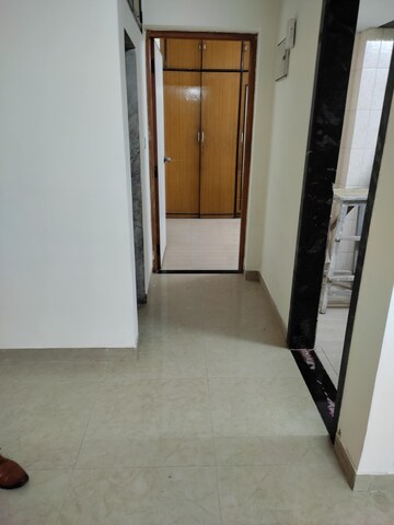 Room in 1 BHK Apartment at Sonal Link Residency, Malad West – for Rent