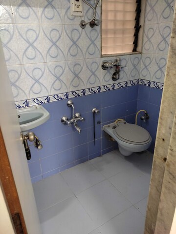 Bathroom in 1 BHK Apartment at Sonal Link Residency, Malad West – for Rent