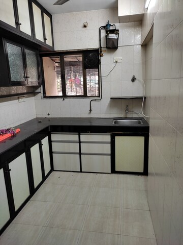 Kitchen in 1 BHK Apartment at Sonal Link Residency, Malad West – for Rent
