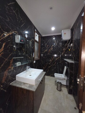 Bathroom in 3 BHK Builder Floor at Freedom Fighters Enclave – for Rent
