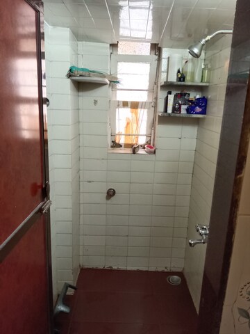 Bathroom in 1 BHK Apartment at New Gitanjali CHS, Malad East – for Rent
