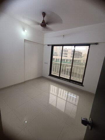 Bedroom in 2 BHK Apartment at Ninaad CHS, Malad West – for Rent