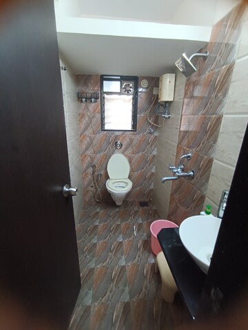 Furnished Amenities in 2 BHK Apartment at Ninaad CHS, Malad West – for Rent