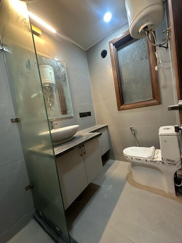 Bathroom in 2 BHK Builder Floor at Freedom Fighters Enclave – for Rent