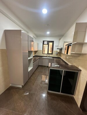Kitchen in 3 BHK Builder Floor at Freedom Fighters Enclave – for Sale